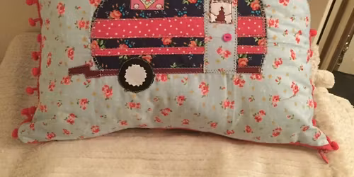 (1 space) Envelope cushion cover with appliqu\u00e9- \u00a330