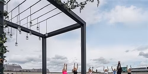Yoga in secret roof garden over-looking Liverpool City Centre