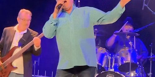 Mike Arnett with his full Band