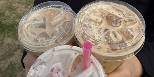 Sota Sips Coffee at Sanford Walk In