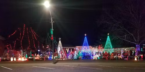 Santa visits Harper and the lights are lit.