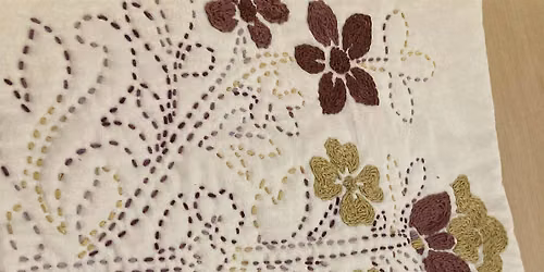 Make a quilted hand embroidered cushion cover