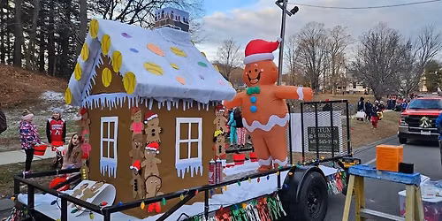 Golden Ticket!! Ride with Santa in the Parade