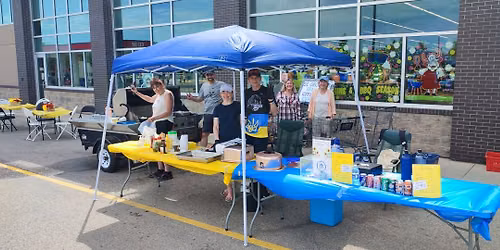 BBQ Fundraiser for Ukraine by Saskatoon UCC. Canadian Tire on Preston Ave N