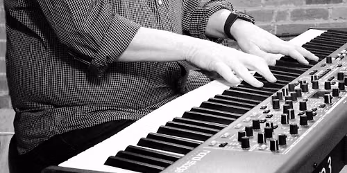 Ed Jones as Elton John Live at The Pearl and Oyster Bar