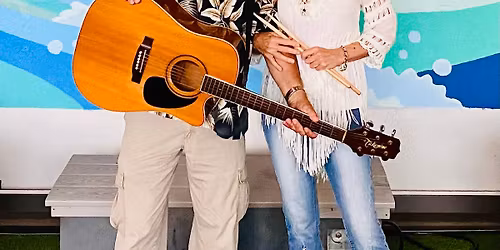 The palms of Destin Vibe Bar