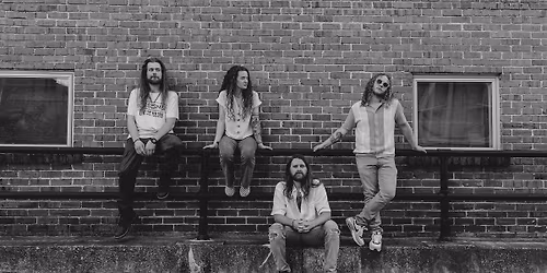 An Evening with Grits & Greens