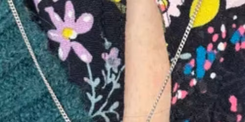 Student wearing one of her makes on our silver & resin workshop. Would you like to find out how?