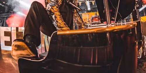 Lee Quinney as Elton John 