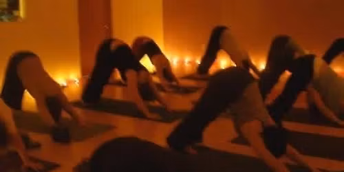 Annual holiday candlelit yoga class