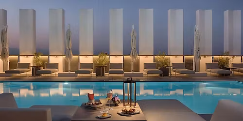 SUNSET NH COLLECTION CITYLIFE | ROOFTOP The District - Cocktail & Pool