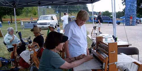 Mug Rug with weaving sticks