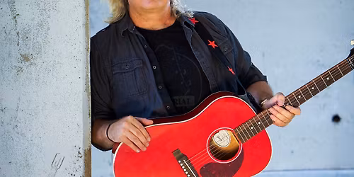 Jamie Coffel and an Acoustic Guitar