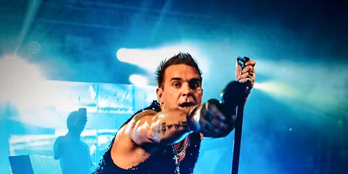 Tony Lewis as Robbie Williams with his band Hot Fudge