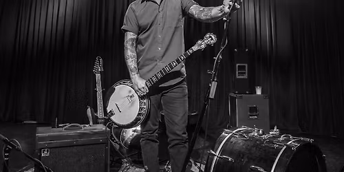 William Elloitt Whitmore w\/ guests (partially seated)