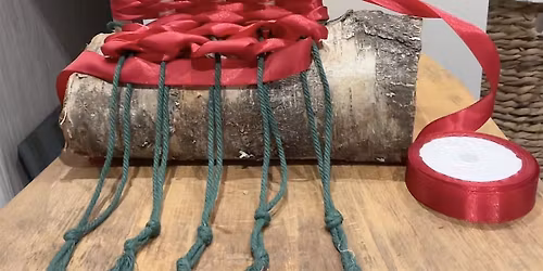 Festive weaving on a hand built peg loom.