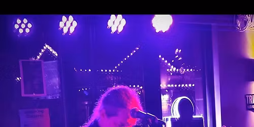 Jim Tierney performs during the Cruise In Car Show