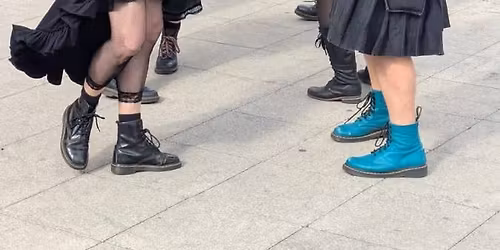 Boudicca Border Morris dancing outside at Late Night Shoping