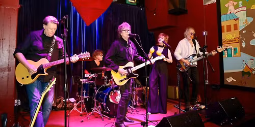 The Footnotes perform at Shoeshine Charley's Big Top