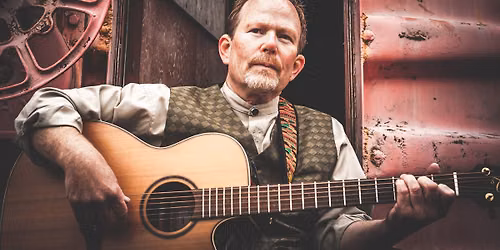 Trevor Price at the Island Roots Farmers' Market