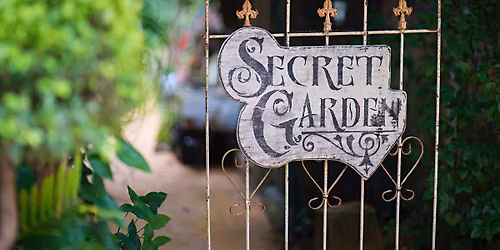 Alice in Wonderland at Waldo's Secret Garden