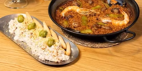 Pa ella, pa \u00e9l, pa todos. Paella valenciana, ensaladilla y dos bebidas en plena Gran V\u00eda