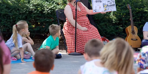 Storytime Under the Green Umbrella