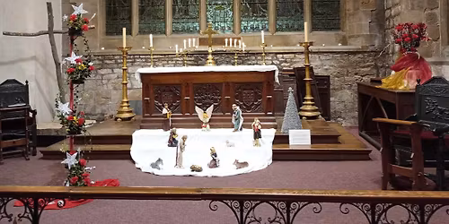 Family Carols with Nativity Tableau and donkey