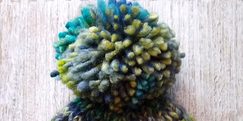 Knit a bobble hat in the round