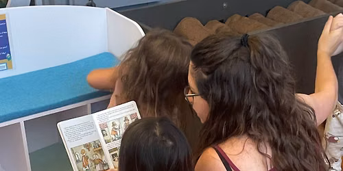 Watkins Story Stroll: "Book Comes Home"