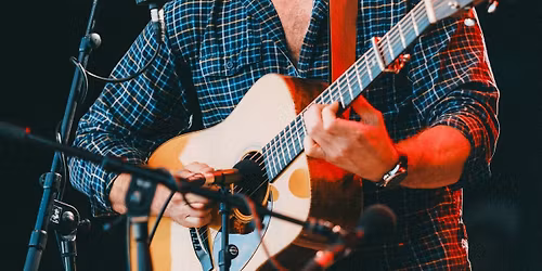 Live music performance by Jed Clark 