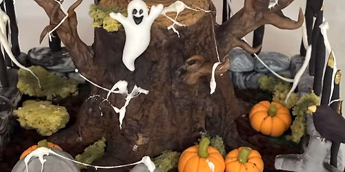 Haunted Halloween tree stump cake