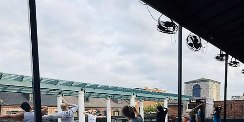 Rooftop Yoga & Martinis~ Wed, June 24 @ 6:30 at The Q on Main Street, St Ch
