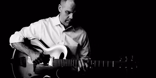 Ben Harris, solo acoustic guitar