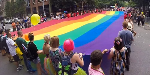 March with the PrideFest Flag in the Pride Parade to Celebrate 20 Years!