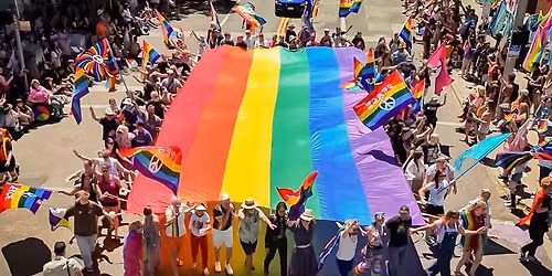 Pride Parade Flag Marching in the Hi-Jinx Parade