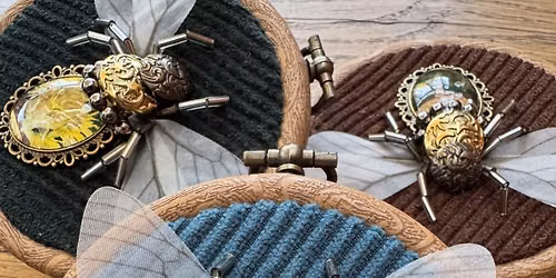 Embroidery hoop old jewelry insects