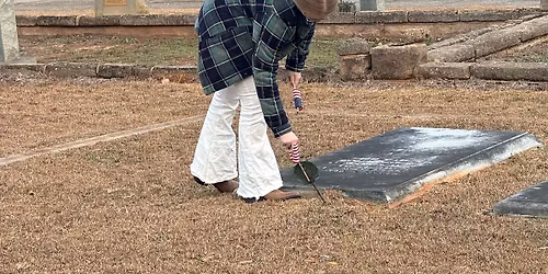 Placing flags on all Veterans Graves