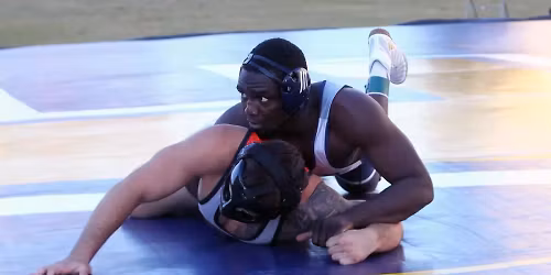 Parking Campbell Fighting Camels at Bellarmine Knights Wrestling