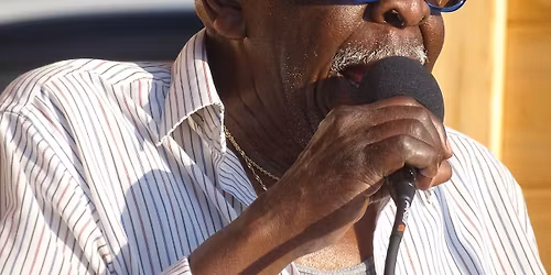 Freddie Cunningham sings the National Anthem and Gina Garner with the Mike Daniels band performs