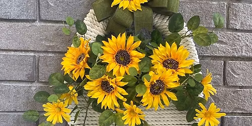 Interchangeable floral wreath basket