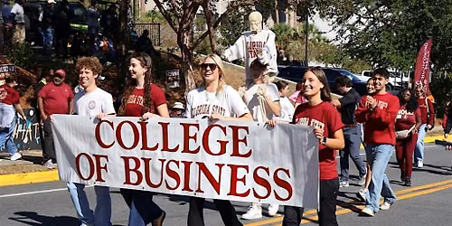 Herbert Wertheim College of Business Walks in the Homecoming Parade!