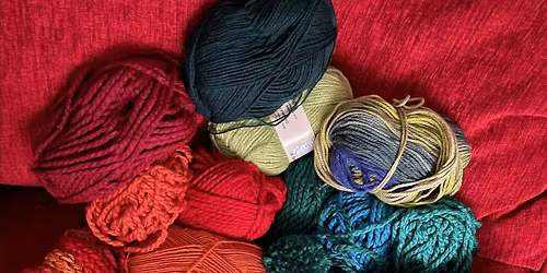 Finger Knit a scarf with Pom Poms. No skill or experience required!