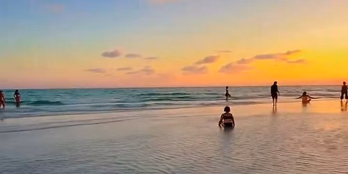 Silent Disco full moon ecstatic dance at sunset on beach with dj kat