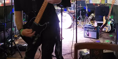 playing at festival  at market Christmas festival Dunstable High Street twilight 2025