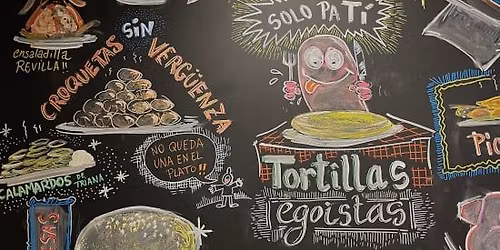 Bocata de calamares y bebida en Tapaloguistas Malasa\u00f1a