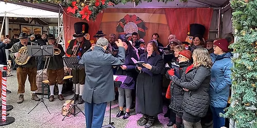 Caroling at Christkindlemarkt