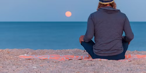 Howl at the Moon Beach Yoga - Amelia Island, FL