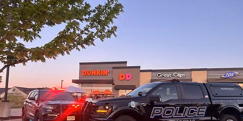 Menasha Dunkin - Cop on a Rooftop