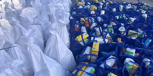 LCAC Holiday Food Drive - Bagging Non-Perishables